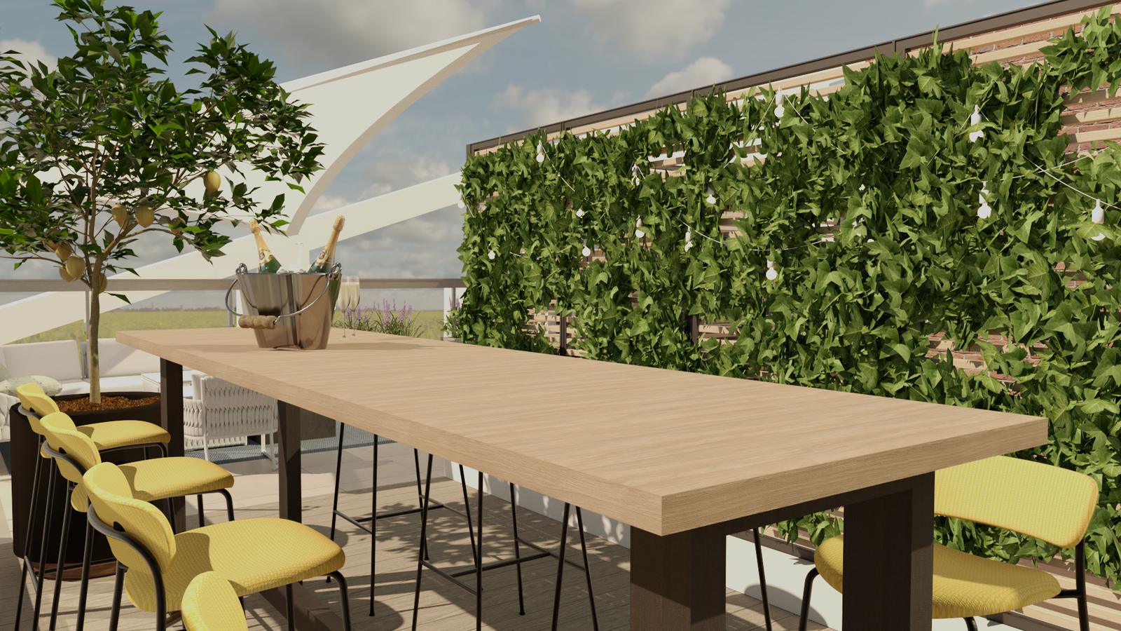 Long table beside a green wall