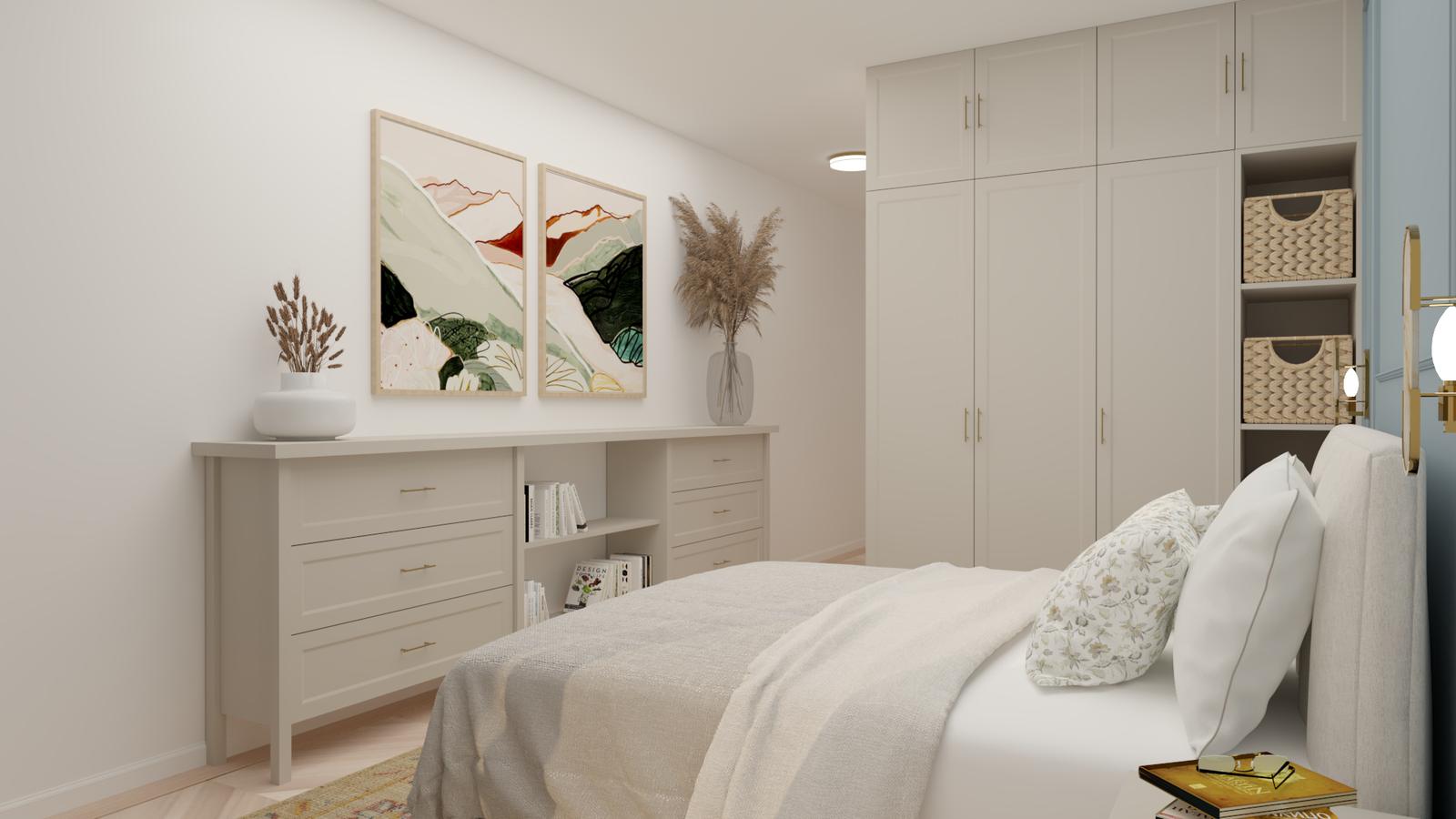 Bedroom with a chest of drawers and artwork